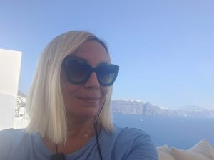 "Vanja Keindl portrait in Santorini, professional and reflective"