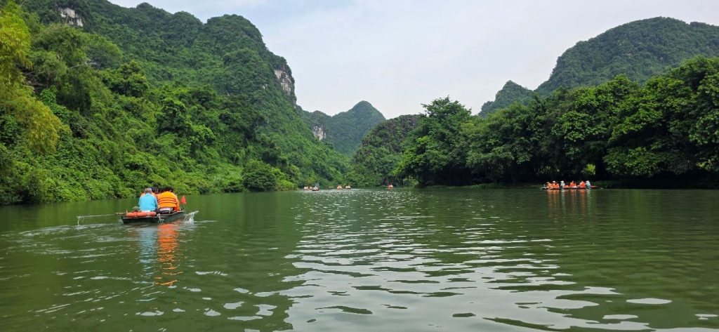 Karst cliffs along the river in Trang An, Ninh Binh, Vietnam – photo: Vanja Keindl
